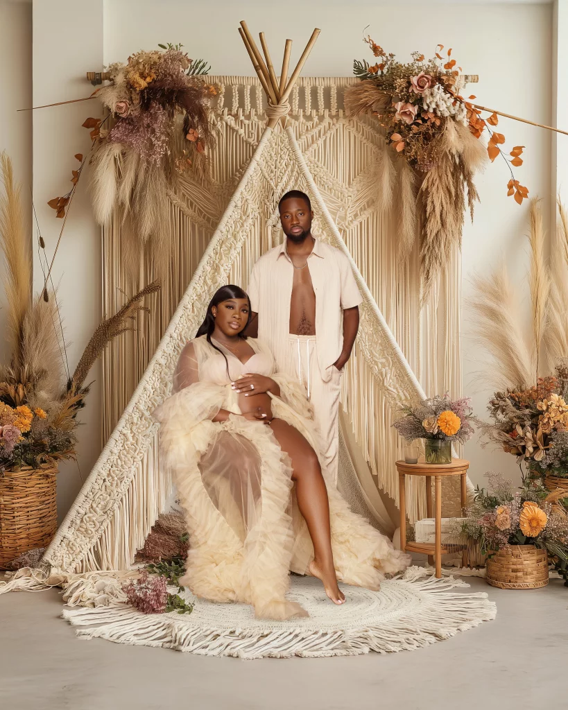 Boho couple maternity portrait on a pampas teepee set at Éniary Studio