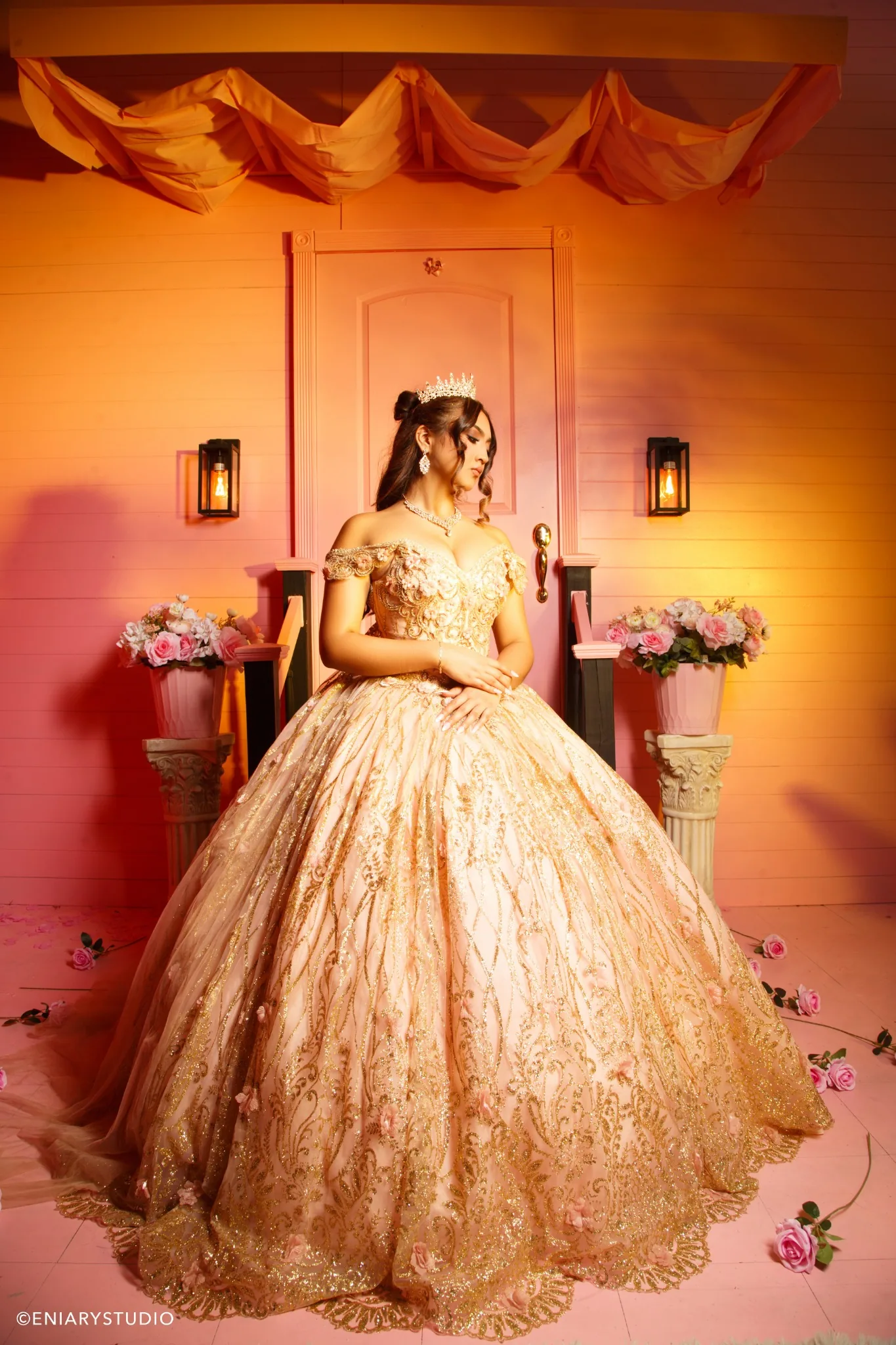 Miami quinceañera portrait in a blush and gold ball gown at Éniary Studio in Miami Gardens