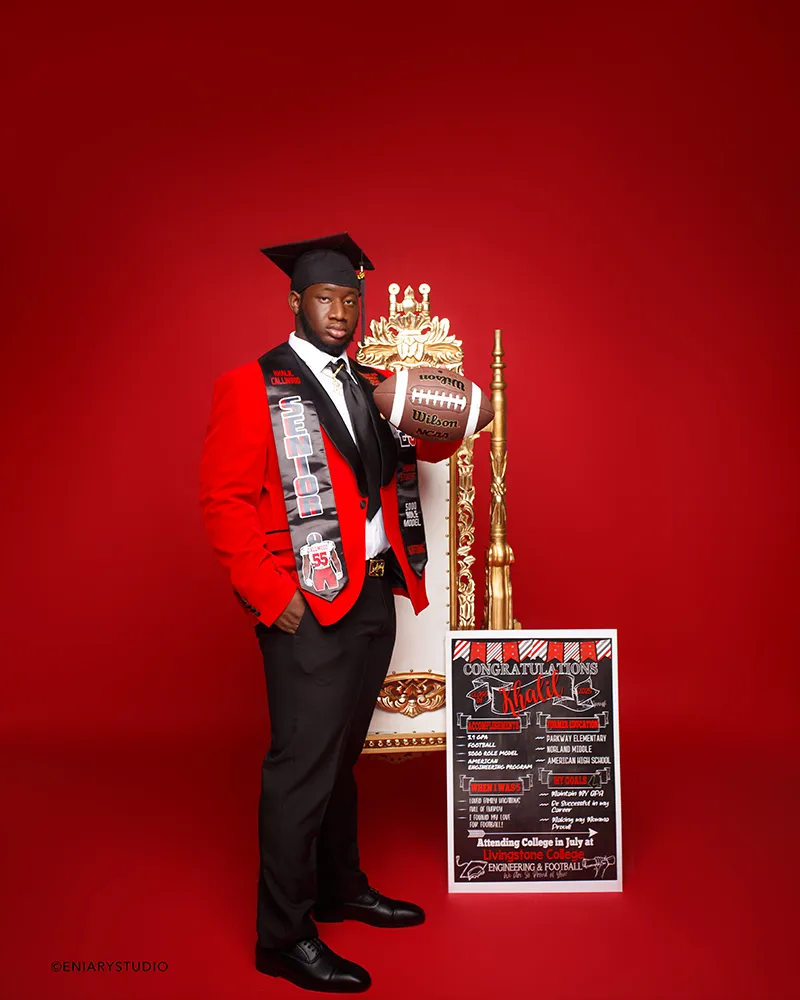 Male graduate football player in cap and formalwear